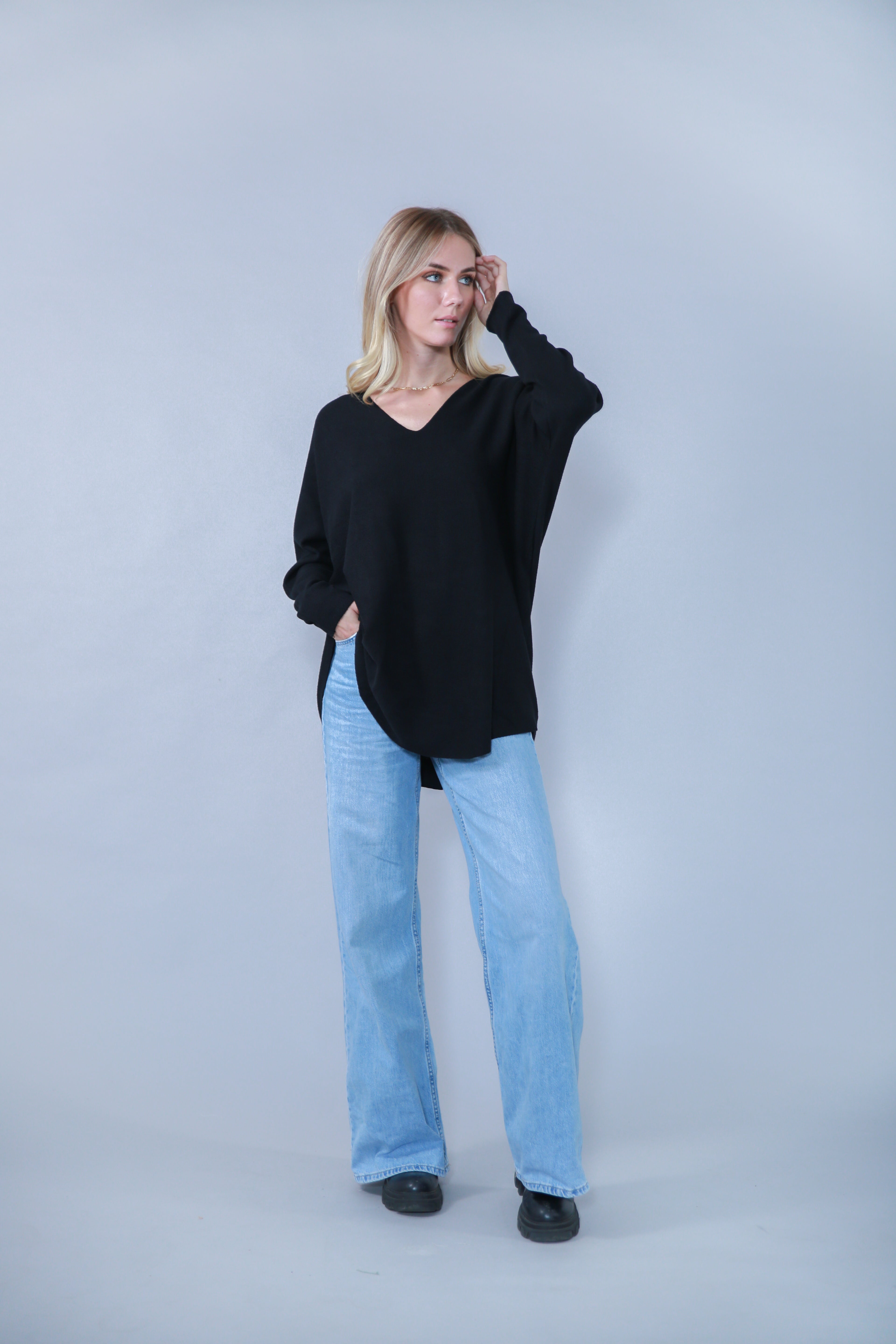 PULL OVERSIZE EN MAILLE COL EN V